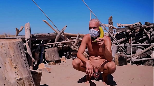 naked pathetic slave in penis cage at the public gay beach, cucumber fuck, banana fuck