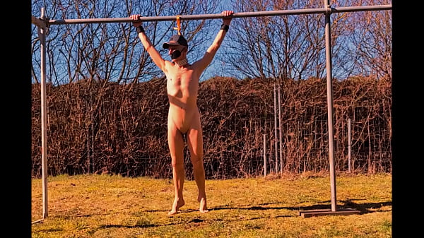 naked pathetic slave in penis cage outdoor tied up at his testicles enjoy the first party
