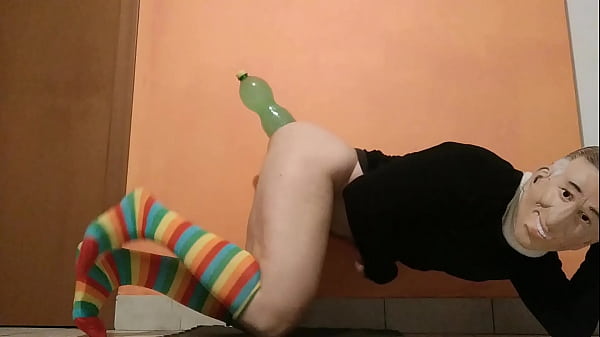 Someone doubted that I could insert this bottle from the bottom. Here are two videos to prove that my ass can do it (video 1)